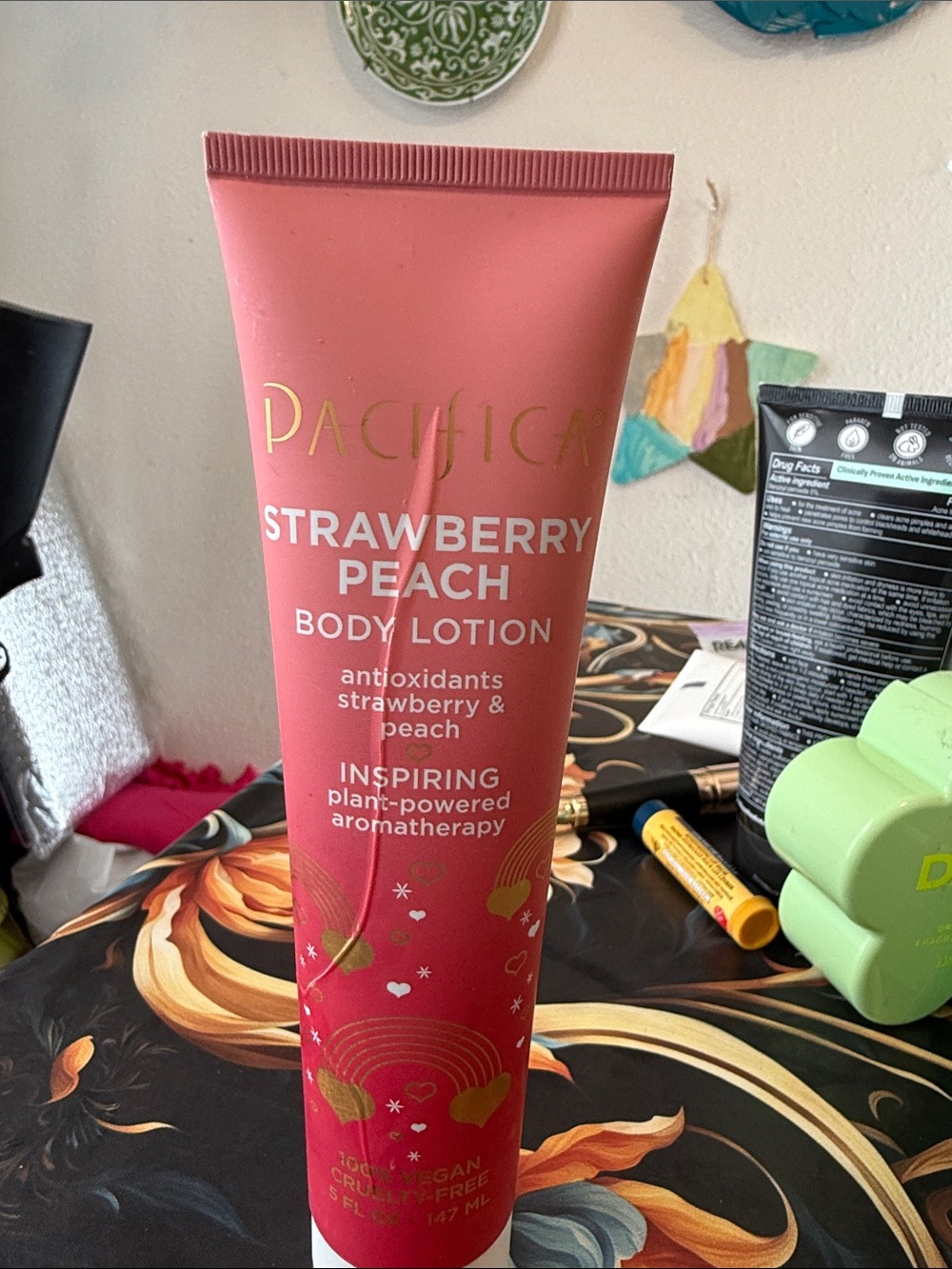 Pacifica Strawberry Peach Body Lotion in coral pink